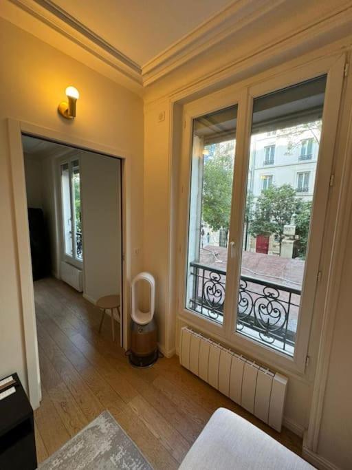 Charmant Appartement Alesia Paris Bagian luar foto